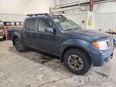 Czwarte zdjęcie samochodu z boku: 2014 NISSAN FRONTIER PRO-4X VIN:1N6AD0EV0EN767092 - miniatura
