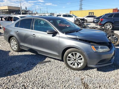 Czwarte zdjęcie samochodu z boku: 2015 VOLKSWAGEN JETTA TDI VIN:3VWLA7AJ4FM423953 - miniatura