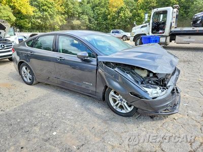 Czwarte zdjęcie samochodu z boku: 2018 FORD FUSION SE HYBRID VIN:3FA6P0LUXJR153321 - miniatura