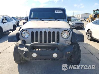 Piąte zdjęcie samochodu w środku: 2017 JEEP WRANGLER UNLIMITED SPORT VIN:1C4BJWDG2HL589384 - miniatura