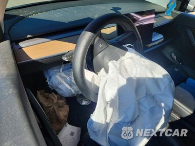 Zdjęcie 9 z 12 samochodu: 2022 TESLA MODEL Y VIN:7SAYGDEEXNF430026 - miniatura