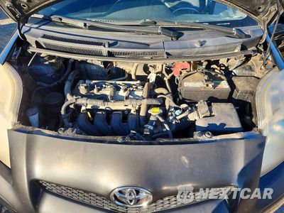 Zdjęcie 11 z 12 samochodu: 2010 TOYOTA YARIS BASE VIN:JTDJT4K34A5296753 - miniatura