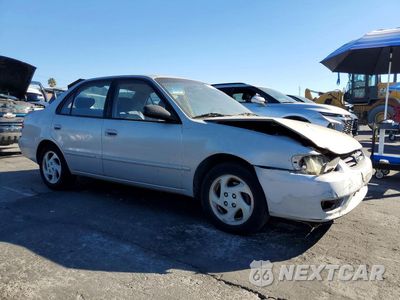 Czwarte zdjęcie samochodu z boku: 2002 TOYOTA COROLLA LE VIN:1NXBR12E62Z607024 - miniatura