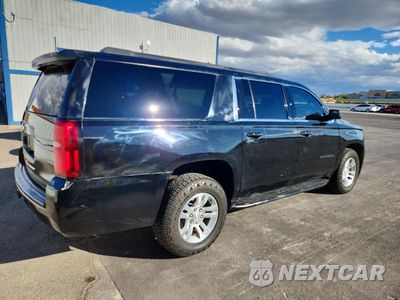 Trzecie zdjęcie samochodu z tyłu: 2020 CHEVROLET SUBURBAN C1500 LT VIN:1GNSCHKC8LR117497 - miniatura