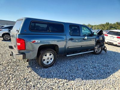 Trzecie zdjęcie samochodu z tyłu: 2013 CHEVROLET SILVERADO C1500 LT VIN:3GCPCSE05DG319003 - miniatura