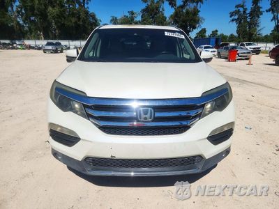 Piąte zdjęcie samochodu w środku: 2016 HONDA PILOT TOURING VIN:5FNYF5H90GB023341 - miniatura