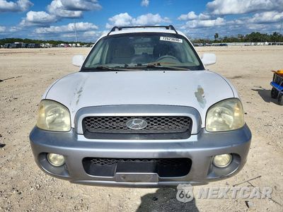 Piąte zdjęcie samochodu w środku: 2004 HYUNDAI SANTA FE GLS VIN:KM8SC13D84U791540 - miniatura