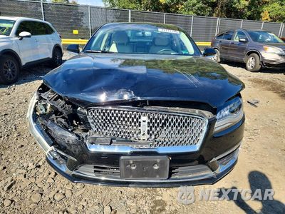 Piąte zdjęcie samochodu w środku: 2017 LINCOLN MKZ SELECT VIN:3LN6L5D9XHR612575 - miniatura