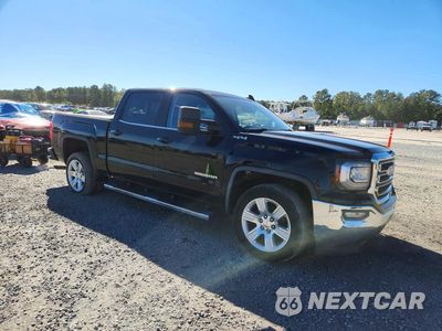 Czwarte zdjęcie samochodu z boku: 2018 GMC SIERRA K1500 SLE VIN:3GTU2MEC6JG115091 - miniatura