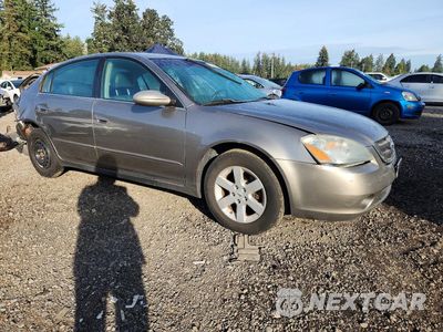 Czwarte zdjęcie samochodu z boku: 2002 NISSAN ALTIMA 2.5 VIN:1N4AL11D22C291935 - miniatura