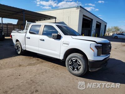 Czwarte zdjęcie samochodu z boku: 2023 FORD F150 LIGHTNING PRO VIN:1FTVW1EL6PWG41304 - miniatura
