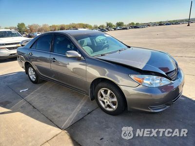 Czwarte zdjęcie samochodu z boku: 2003 TOYOTA CAMRY LE VIN:4T1BE32K33U718712 - miniatura