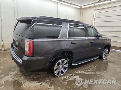 Trzecie zdjęcie samochodu z tyłu: 2016 GMC YUKON SLT VIN:1GKS2BKCXGR438427 - miniatura
