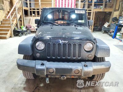 Piąte zdjęcie samochodu w środku: 2015 JEEP WRANGLER UNLIMITED SPORT VIN:1C4BJWDG1FL761014 - miniatura