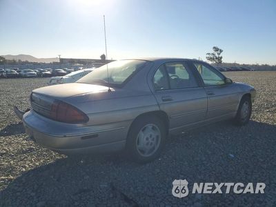 Trzecie zdjęcie samochodu z tyłu: 1999 CHEVROLET LUMINA BASE VIN:2G1WL52M4X9100710 - miniatura