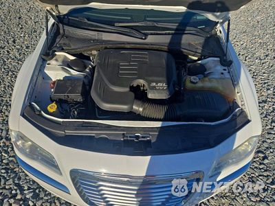Zdjęcie 11 z 12 samochodu: 2014 CHRYSLER 300C VIN:2C3CCAEG6EH379903 - miniatura