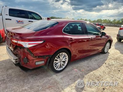 Trzecie zdjęcie samochodu z tyłu: 2019 TOYOTA CAMRY HYBRID XLE VIN:4T1B21HK7KU510917 - miniatura