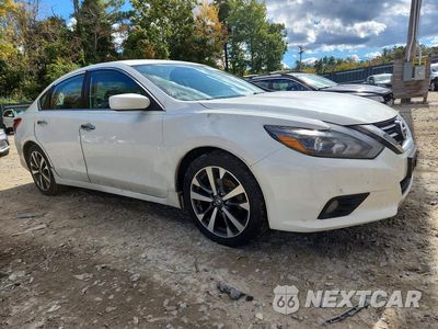Czwarte zdjęcie samochodu z boku: 2017 NISSAN ALTIMA 2.5 SR VIN:1N4AL3AP2HC148238 - miniatura