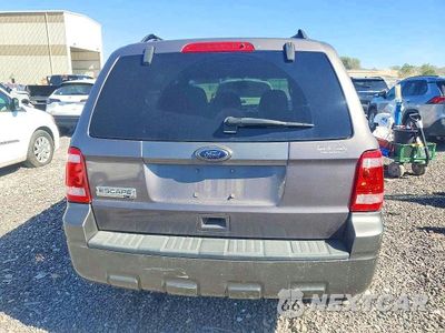 Zdjęcie 6 z 13 samochodu: 2010 FORD ESCAPE VIN:1FMCU0D78AKA43236 - miniatura