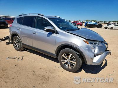 Czwarte zdjęcie samochodu z boku: 2018 TOYOTA RAV4 XLE VIN:JTMWFREV4JJ203406 - miniatura