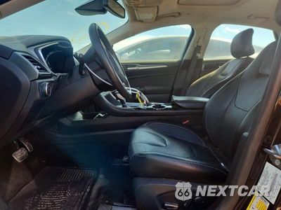 Zdjęcie 7 z 13 samochodu: 2016 FORD FUSION TITANIUM PHEV VIN:3FA6P0SU1GR141911 - miniatura