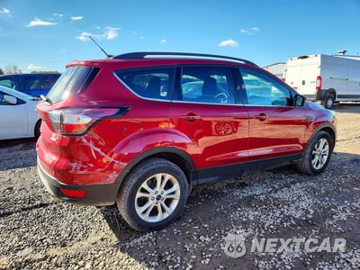 Trzecie zdjęcie samochodu z tyłu: 2018 FORD ESCAPE SE VIN:1FMCU9GD2JUB02016 - miniatura