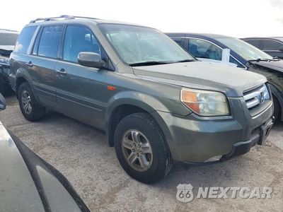 Czwarte zdjęcie samochodu z boku: 2007 HONDA PILOT EXL VIN:5FNYF18507B027993 - miniatura