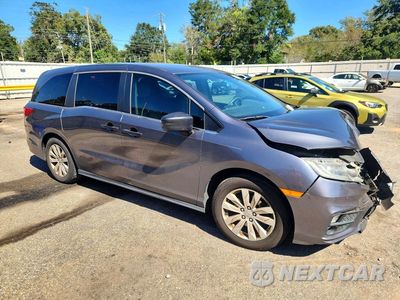 Czwarte zdjęcie samochodu z boku: 2018 HONDA ODYSSEY LX VIN:5FNRL6H24JB053049 - miniatura