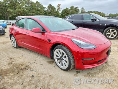 Czwarte zdjęcie samochodu z boku: 2021 TESLA MODEL 3 VIN:5YJ3E1EB5MF054397 - miniatura