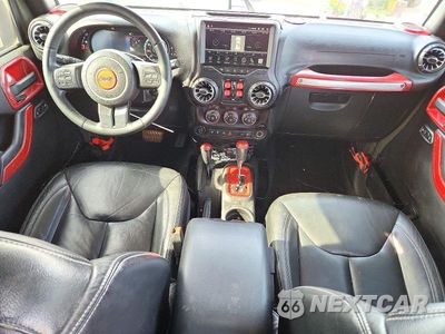 Zdjęcie 8 z 12 samochodu: 2015 JEEP WRANGLER UNLIMITED SAHARA VIN:1C4BJWEG3FL743774 - miniatura