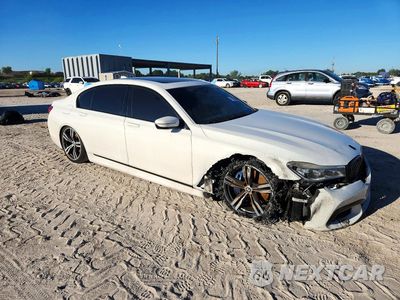 Czwarte zdjęcie samochodu z boku: 2018 BMW 750 I VIN:WBA7F0C53JGM23732 - miniatura