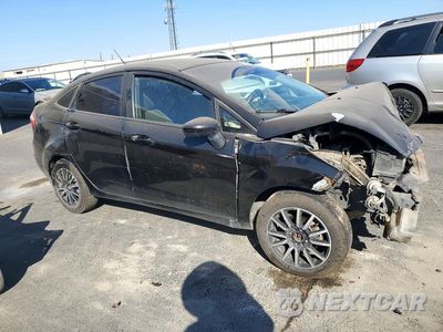 Czwarte zdjęcie samochodu z boku: 2014 FORD FIESTA S VIN:3FADP4AJ1EM183155 - miniatura
