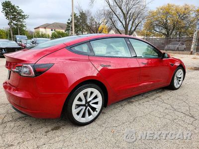 Trzecie zdjęcie samochodu z tyłu: 2022 TESLA MODEL 3 VIN:5YJ3E1EA2NF286089 - miniatura