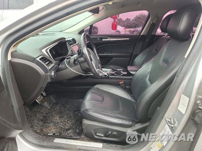 Zdjęcie 7 z 12 samochodu: 2014 FORD FUSION TITANIUM VIN:3FA6P0K9XER208840 - miniatura