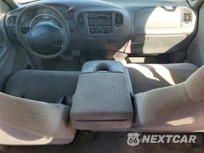 Zdjęcie 8 z 12 samochodu: 2000 FORD F150 VIN:1FTRX17L1YKA73385 - miniatura