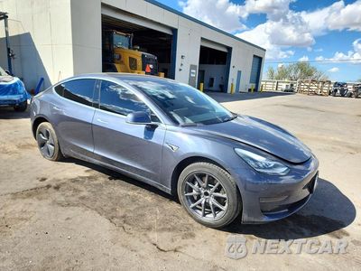 Czwarte zdjęcie samochodu z boku: 2020 TESLA MODEL 3 VIN:5YJ3E1EA8LF703213 - miniatura