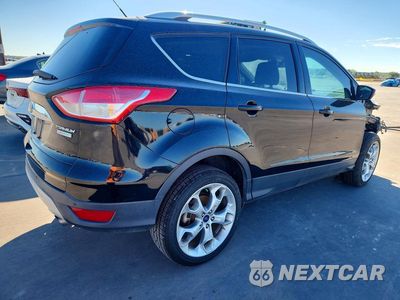 Trzecie zdjęcie samochodu z tyłu: 2016 FORD ESCAPE TITANIUM VIN:1FMCU0J97GUC78388 - miniatura