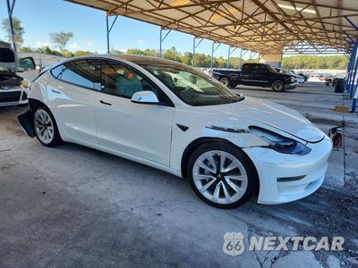 Czwarte zdjęcie samochodu z boku: 2022 TESLA MODEL 3 VIN:5YJ3E1EBXNF268691 - miniatura