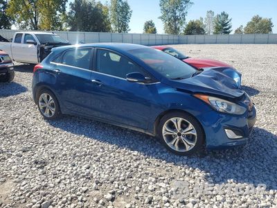 Czwarte zdjęcie samochodu z boku: 2014 HYUNDAI ELANTRA GT BASE VIN:KMHD35LH0EU220127 - miniatura