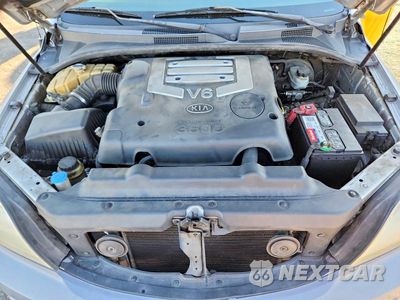 Zdjęcie 12 z 13 samochodu: 2005 KIA SORENTO LX VIN:KNDJD733X55404182 - miniatura