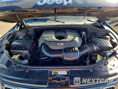 Zdjęcie 12 z 13 samochodu: 2014 JEEP GRAND CHEROKEE LAREDO VIN:1C4RJFAG7EC482068 - miniatura