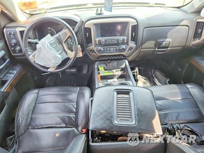 Zdjęcie 8 z 13 samochodu: 2017 GMC SIERRA K1500 DENALI VIN:3GTU2PEJ6HG400156 - miniatura
