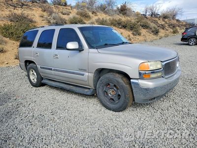 Czwarte zdjęcie samochodu z boku: 2004 GMC YUKON VIN:1GKEC13V04R182590 - miniatura