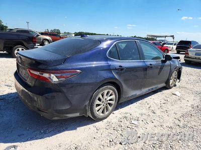 Trzecie zdjęcie samochodu z tyłu: 2022 TOYOTA CAMRY LE VIN:4T1C11AK9NU637917 - miniatura