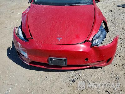 Zdjęcie 12 z 13 samochodu: 2022 TESLA MODEL Y VIN:7SAYGDEE6NF342154 - miniatura