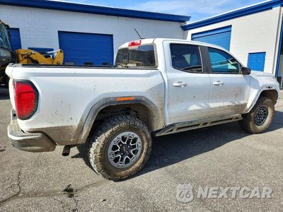 Trzecie zdjęcie samochodu z tyłu: 2023 GMC CANYON AT4X VIN:1GTP6EEK4P1213378 - miniatura