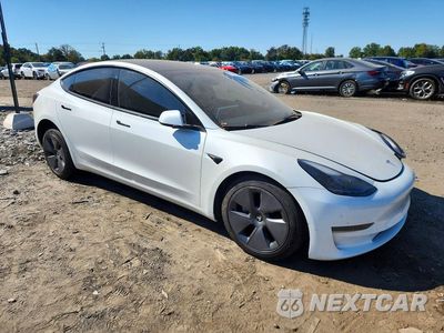 Czwarte zdjęcie samochodu z boku: 2023 TESLA MODEL 3 VIN:5YJ3E1EA8PF499681 - miniatura