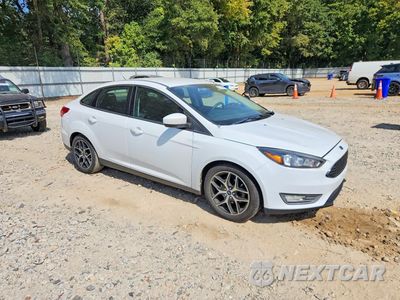 Czwarte zdjęcie samochodu z boku: 2018 FORD FOCUS SE VIN:1FADP3F22JL265287 - miniatura