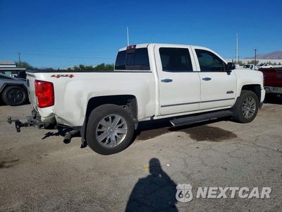 Trzecie zdjęcie samochodu z tyłu: 2017 CHEVROLET SILVERADO K1500 HIGH COUNTRY VIN:3GCUKTECXHG484699 - miniatura