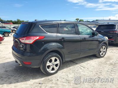 Trzecie zdjęcie samochodu z tyłu: 2014 FORD ESCAPE SE VIN:1FMCU9G9XEUB04436 - miniatura
